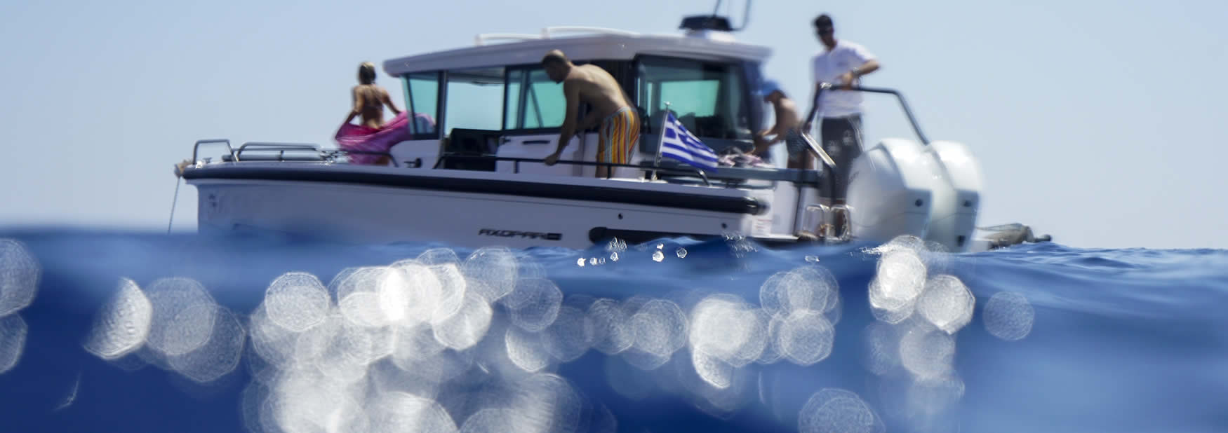 Boat rental based in Milos island. The sea pig is actually an Axopar 28 with Cabin.