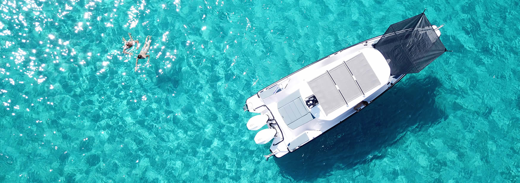 Boat rental based in Milos island. The sea pig is actually an Axopar 28 with Cabin.