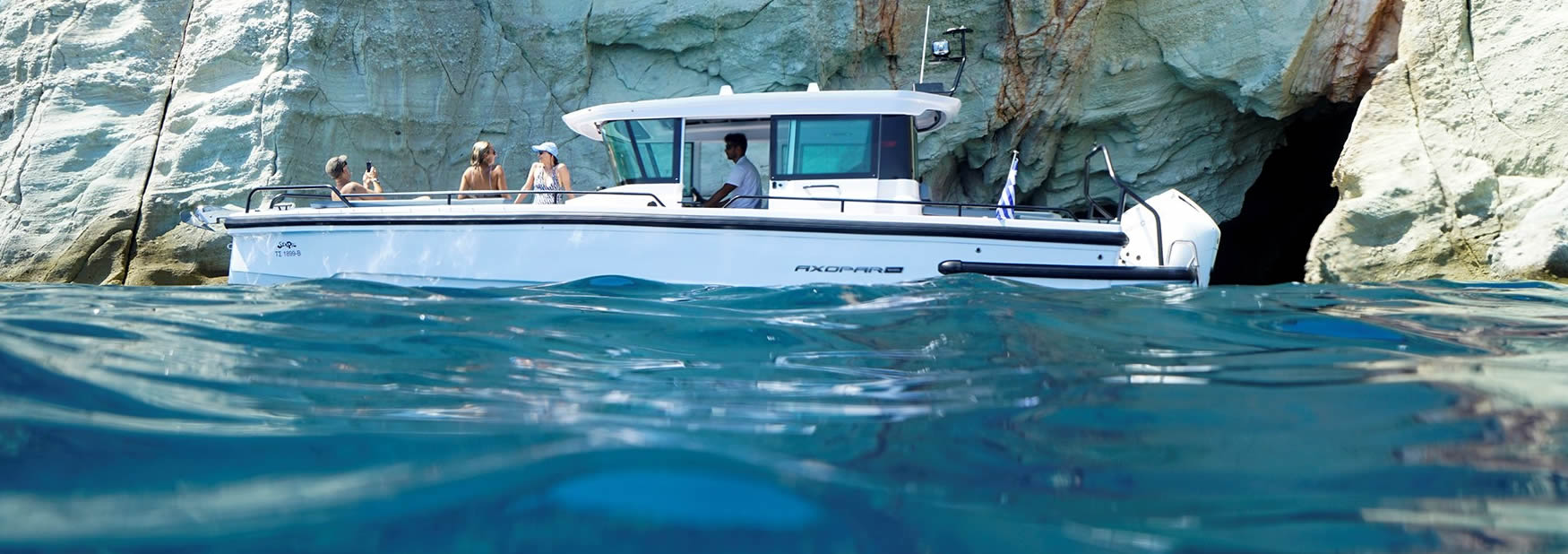 Boat rental based in Milos island. The sea pig is actually an Axopar 28 with Cabin