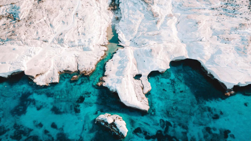 Sarakiniko, the beach with the lunar-like landscape full of boulders, valleys and caves. It is located on the northern shore of Milos island. Rumors have it that it was named after the Saracen pirates that used its caves as shelter. It was mostly formed by fossil layering